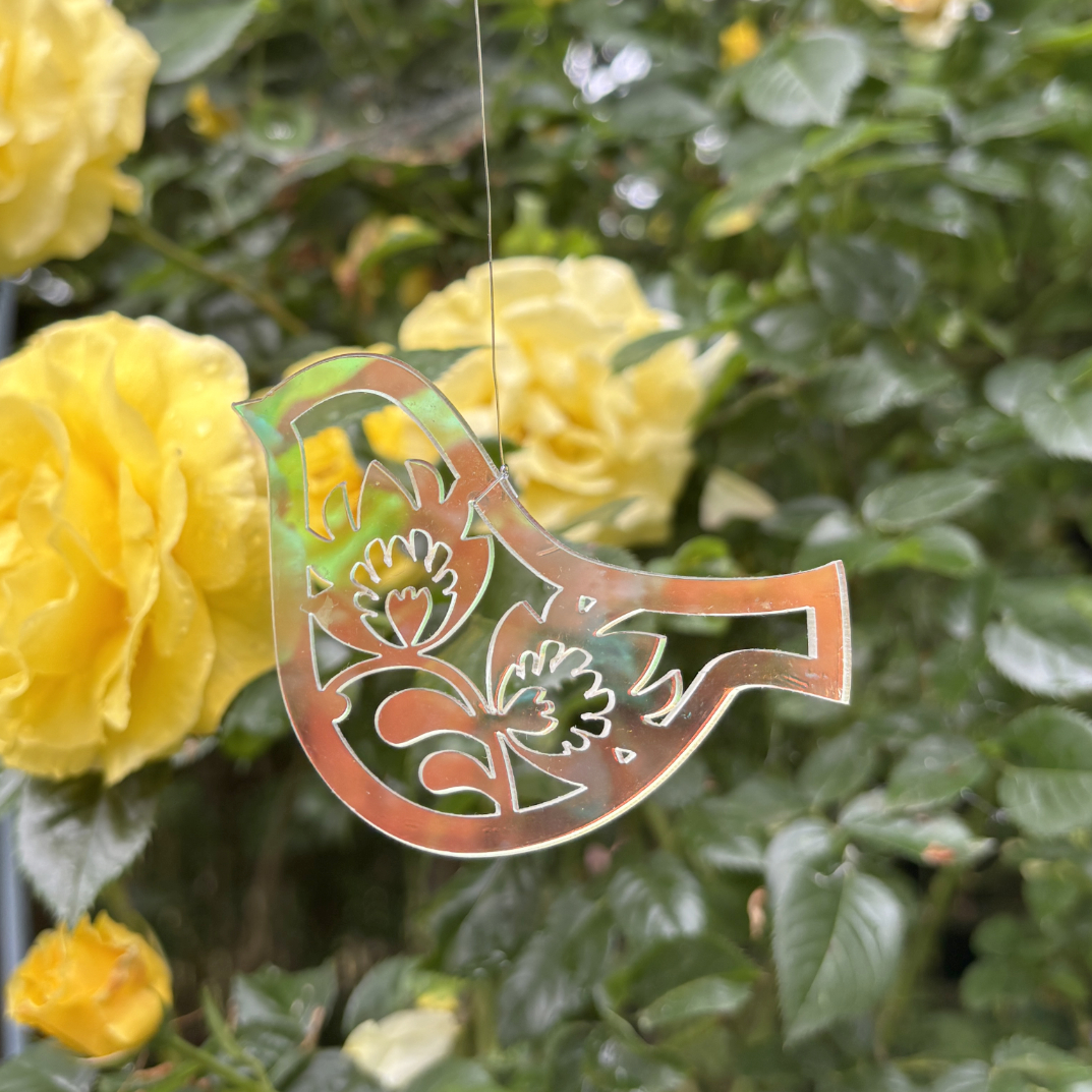 transparent bird with folk ornament